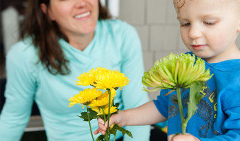 Mother and son with flowers